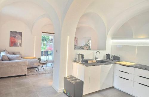 Kippenheim Apartment | Design I Gewölbe I sanierter Pferdestall I EuropaPark I Boxspring I Nespresso I Terrasse I Parkplatz