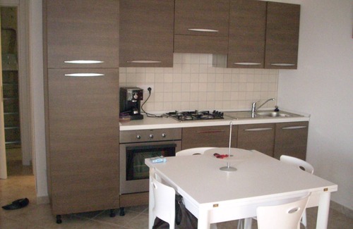 Trinita d'Agultu Apartment | Dolphin apartment with large sea view garden