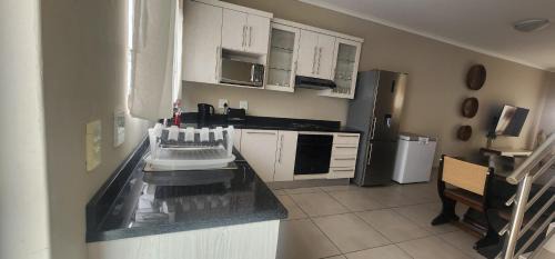 Rand Rifles Apartment | Dolphin Leap Unit 6