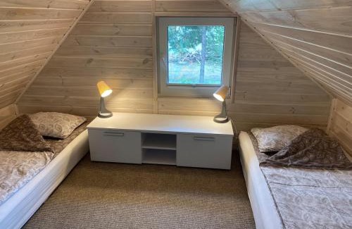 Przechlewo House | Domek w ogrodzie przy lesie i jeziorze GiNTEROWO