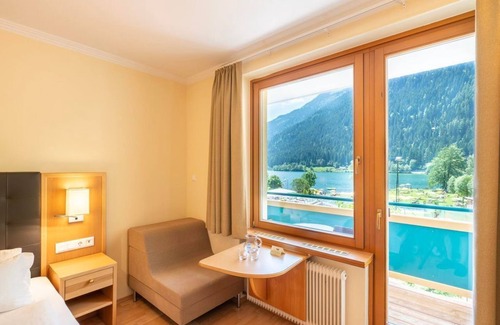 Feld am See House | Doppelzimmer "tennisfan" ab 7 N - Familien-sportresort Brennseehof