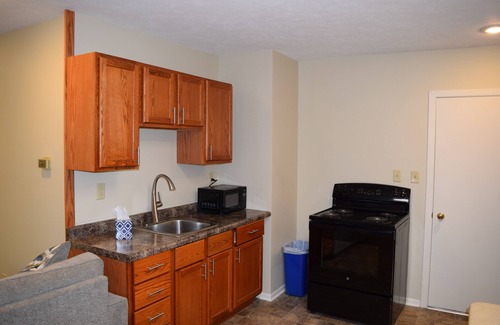Escanaba Apartment | Downtown Escanaba Gem: Spacious Extended Stay Rental Above Commercial Space!