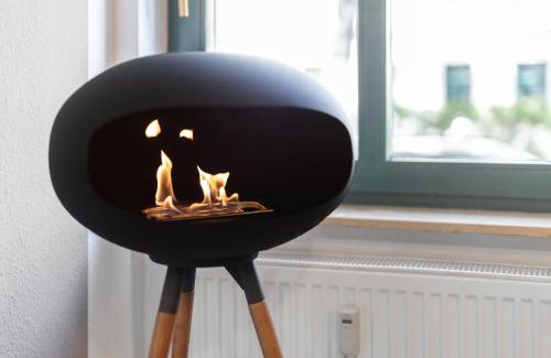 Dresden Apartment | DresdenStay gemütlich und modern mit Kamin und PS4