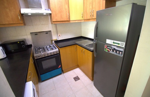 Discovery Gardens Apartment | DRUVYA HOLIDAY HOMES, Bld DG194, Street No,2 Discovery Gardens, Close to Metro