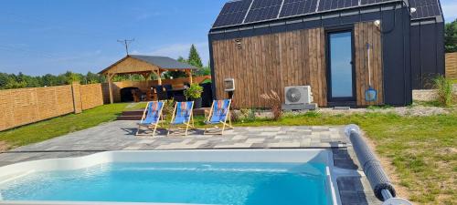 gmina Morawica House | Dwa Wymiary - Całoroczny domek z Jacuzzi i basenem podgrzewany w okresie wiosna - lato w cenie