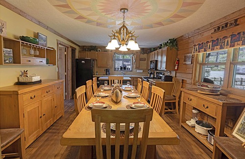 Snowshoe House | Edelweiss Haus: Elegant winter retreat with a private hot tub sanctuary.