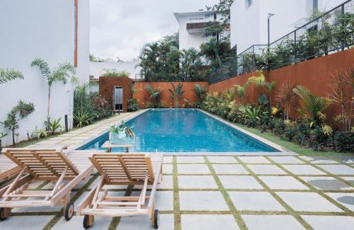 Nerul Apartment | El Volar 2BHK Luxury Apartments 10 Minutes from Candolim Beach with Big common Pool, Fully Equipped Kitchen, 24x7 Security, Wifi