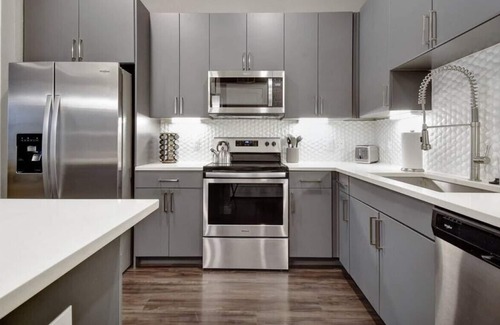 Main - Military Plaza Apartment | Elegant Escape | Fast WiFi | Pool | Free Parking