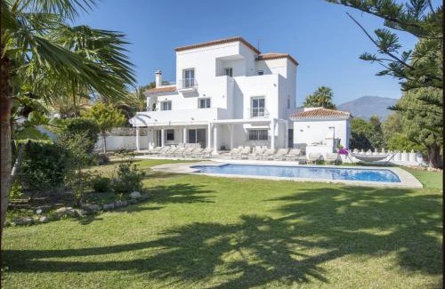 Puerto Banus Villa | Elegant Villa Retreat with Lush Gardens by Lodgerstrip
