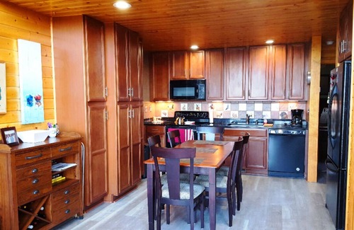 Traverse City Cabin | ELK RAPIDS SUNSET CHALET - Sandy Beach frontage & Sunset over the bay