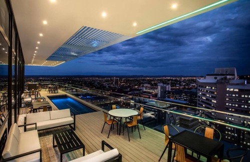 Windhoek Central Apartment | Enchanting Views In Namibia! Spacious Accommodation, Rooftop Pool, Free Parking!