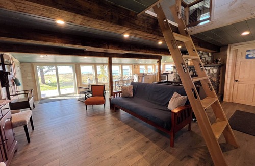 Mid-Coast and Islands House | Enjoy picturesque inlet views of a working harbor and sunny days at your oceanfront cottage