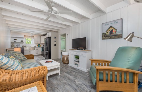 Rehoboth by the Sea Cottage | Enjoy the screened in porch just steps from the beach.