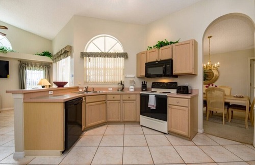 Sunridge Woods Villa | Executive waterfront 4 bed 3 bath, south facing private pool and covered lanai