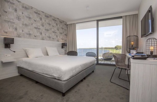 Oranjeplaat Hotel | Explore Diverse Outdoor Activities From Modern Room| Near Deltapark Neeltje Jans