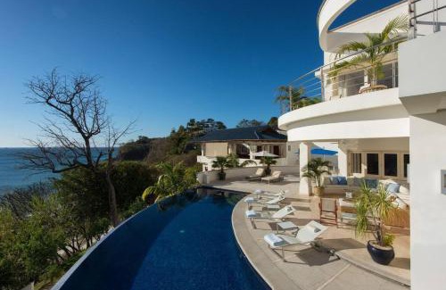 Playa Flamingo House | Exquisite Hilltop Villa with Luxurious Modern Design, Sweeping Ocean Views & Sparkling Infinity Pool