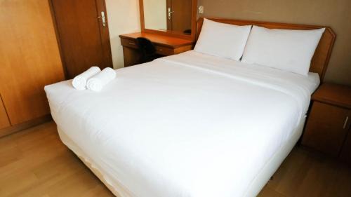 Surabaya Apartment | Extra Spacious and Homey 2BR at Kondominium Puncak Marina Apartment By Travelio