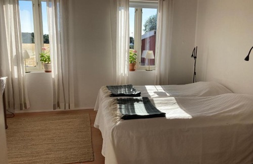 Hoor Apartment | Förtjusande gästsvit med öppen spis