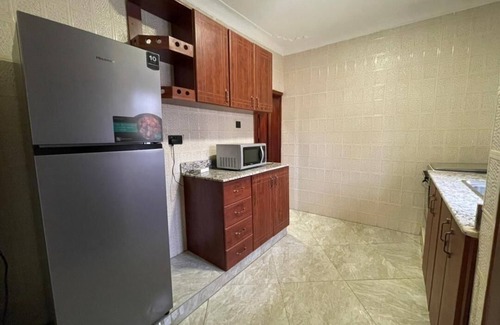 Central Kampala Apartment | Fabulous 2-BR/2BR, Fully furnished gated apartment. 1 mile fromThe Acacia Mall