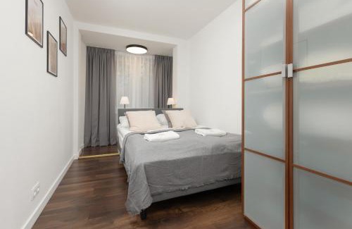 Saska Kepa Apartment | Family Apartment near PGE Narodowy by Noclegi Renters