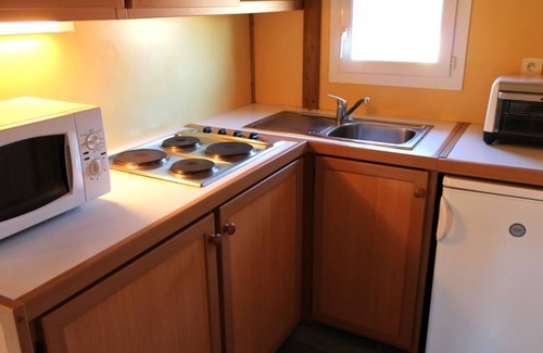 Treignat Cottage | Family chalet in campsite with natural pool