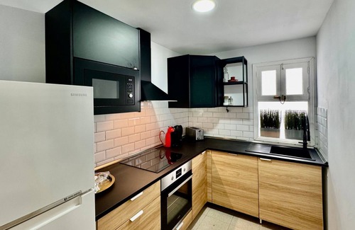Playa Honda Apartment | Family Palms Retreat: Terrace, BBQ & Beach Bliss! By Bayside Rentals