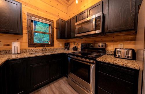Equality House | Fantastic Treehouse with Fire Pit and Hot-tub in Herod, Illinois