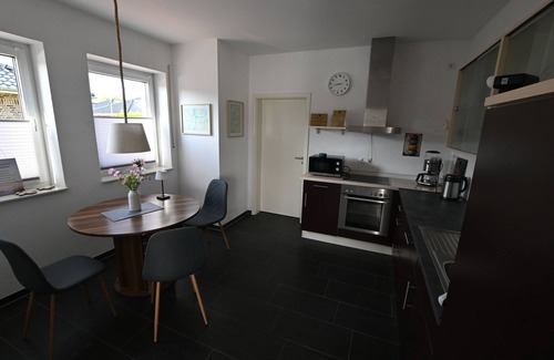 Papenburg House | Feel-good vacation home with a view of the natural lake from the terrace