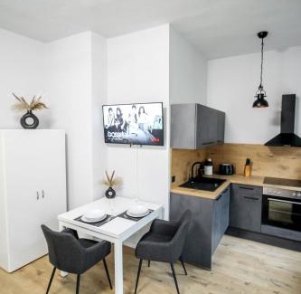 Nordfront Apartment | Ferienwohnung Lorenz mit kostenlosem Parkplatz Netflix Boxspringbett Küche