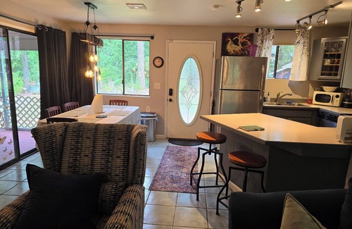 Rainier Cabin | Fish, kayak or relax at a riverfront cabin in the woods of Rainier, Washington!