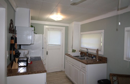 St. Lucie Village Cottage | Fishing Cottage With 250 ft dock and boat slip 2 miles to the Atlantic Ocean