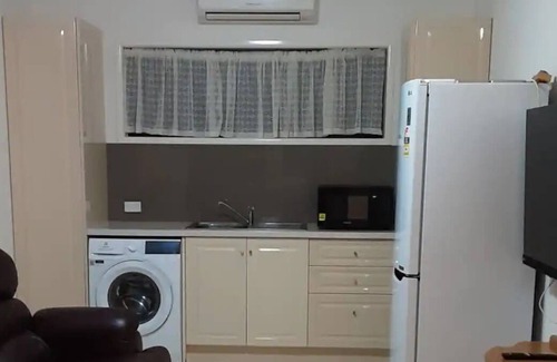 Moore Park Beach House | Flat A/C Fans Pet Friendly accept up to medium dog Please book pet in. Yard