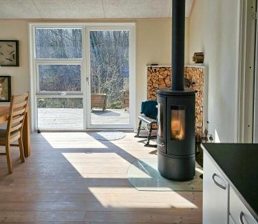 Hojslev House | Forest House With Stream By Hjarbæk Fjord