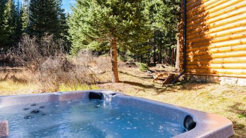 Quandary Village House | Forest Views Hot Tub Fireplace Minutes from Breckenridge Shangri-La Cabin by AvantStay