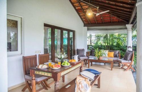 Nerul Apartment | Frangipani 4BR with Pool & Field View