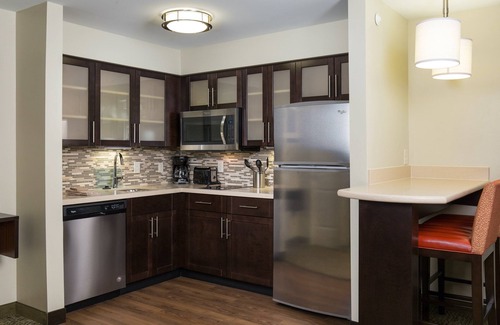 Northfield Apartment | Free Breakfast Buffet. Pool & Gym Access. Near Colorado Convention Center.
