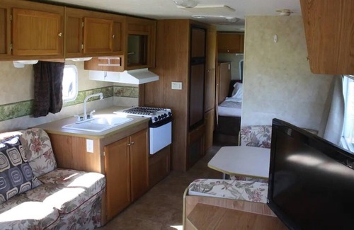 Mavillette House | Fully equipped camper on Mavillette River. Close to the beach. (pet friendly)