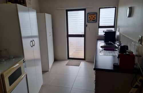 Stanmore Bay House | Fully self contained guest suite, beautiful sea views. 7 minutes walk to beach