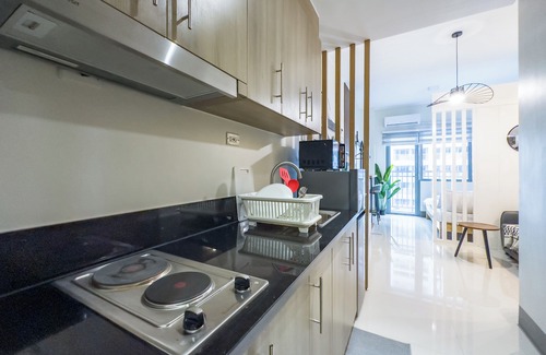 Highway Hills Condo | GemstoneBR in SMDC Fame Residences