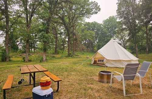St Croix Falls RV Rental | Glamp Tent at Historic estate Big Rock Creek