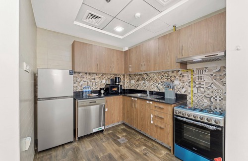 Jumeirah Village Triangle Apartment | Golden Wood Views