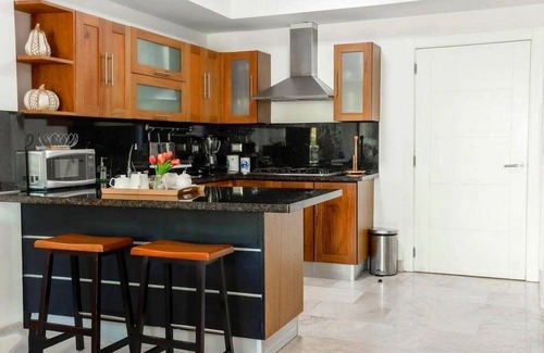 Puerto Plata Apartment | Golf, gym, tennis & pool—right on a tropical beach!