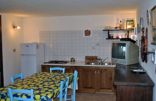 Sant'Antioco Apartment | Ground floor apartment, veranda with barbecue, garden, tennis court