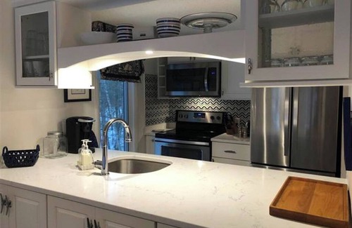 Menonaqua Beach Condo | Harbor Springs Harbor Cove Condo with beach access.