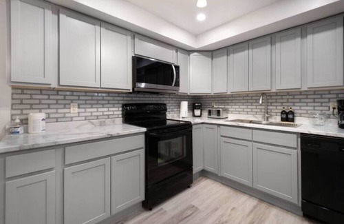 Moncton Apartment | Have fun with the whole family at this stylish place.