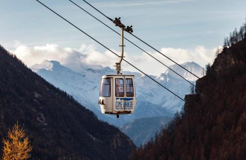 Valtournenche Apartment | HelloChalet - Maison Paquier - Family Ski Holiday in the resort center