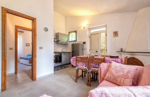 Trinita d'Agultu e Vignola House | Holiday Home 'Rose's House' with Lateral Sea View, Private Terrace and Private Garden