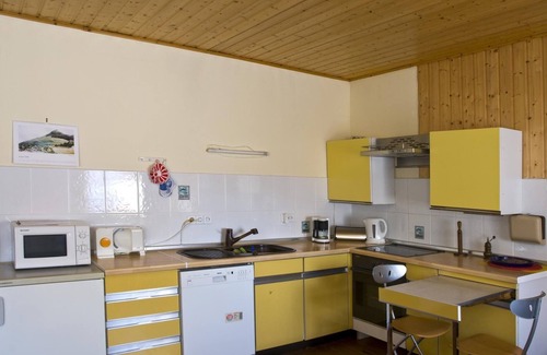 Beerfelden Apartment | Holiday apartment with a garden and a shared pool, as well as a cosy tiled fireplace stove in the living room