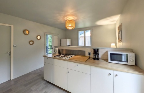 Milhac-de-Nontron Ski Chalet | Holiday Home 'Chalet Vintage' with Shared Pool, Private Terrace and Shared Garden