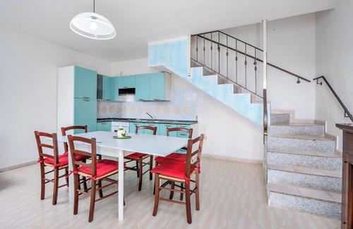Tanaunella House | Holiday Home 'Tanaunella Appartamento' with Ventilators, Balcony, Terraces & Sea View
